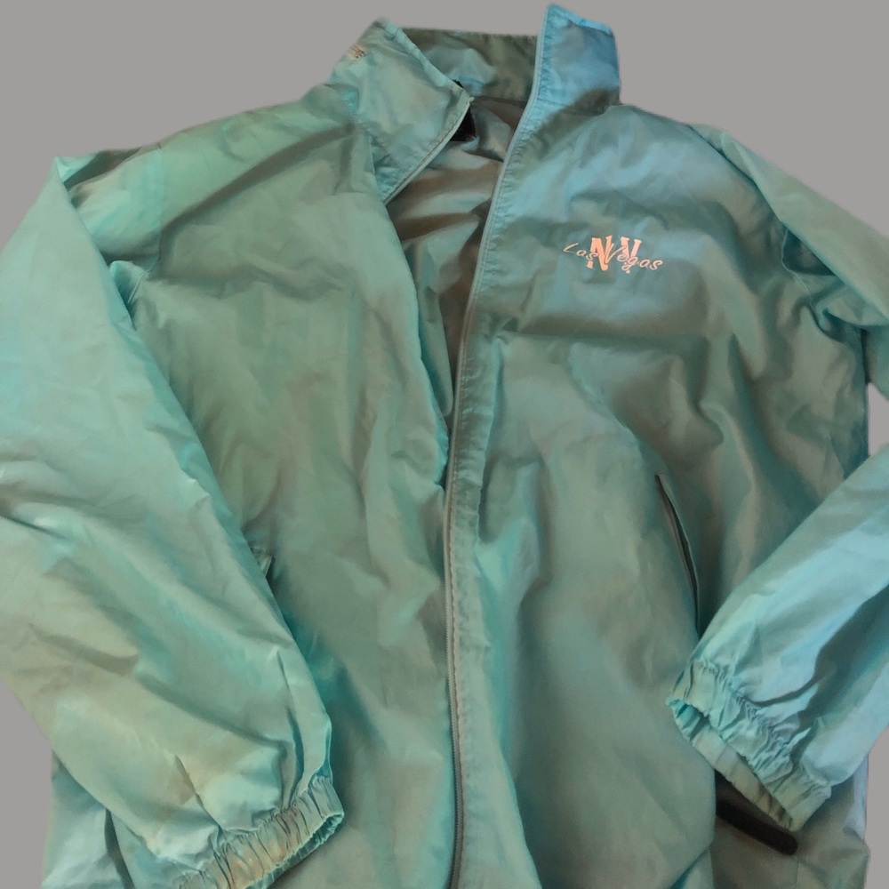 Xl Las Vegas raincoat with zipper pouch for hood